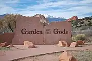 The entrance to Garden of the Gods with Pikes Peak in the background