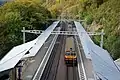 A view from above looking northward over the platforms.