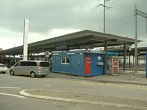 Station platforms with overhead canopies