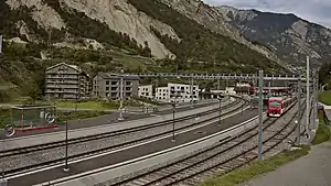 Railway junction with station in between two lines