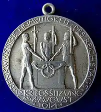 Germany entering WWI confirmed by unanimous Reichstag vote on 4 August 1914, documented by silver medal, obverse