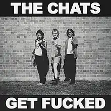 A black-and-white image of the three band members – Josh, Eamon and Matt – holding up their middle finger to the camera. Atop the image in bold white text is "THE CHATS", and below the image, "GET FUCKED".