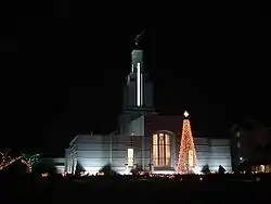 Large Mormon temple at night, with Christmas lights