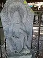 Statue of Kannon with engraved inscriptions