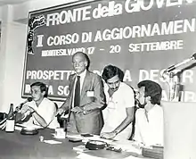 Gasparri (second from right) addressing the Youth Front in 1981, alongside Giorgio Almirante (second from left), Gianfranco Fini and Almerigo Grilz.