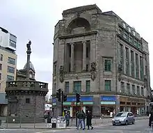 Edith Hughes: Glasgow Mercat Cross (left) (1930)