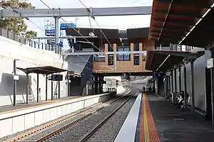 A Northbound View of Glenroy station with a modern concourse and lowered platforms