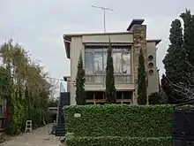 Glenunga Flats, Armadale. Completed in 1941; Frederick Romberg and Mary Turner Shaw, architects. A hybrid of Functionalist components with folksy, 'European Chalet Style’ materials.[89]