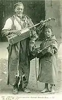 Oran, Algeria, early 20th century. The Geumbri is also an instrument of Morocco, used in Gnawa ceremonies.