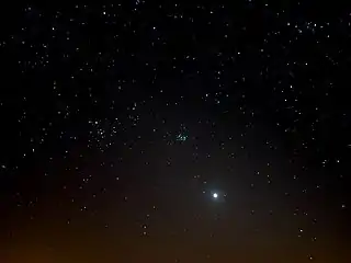 The bright Venus in the cone of the zodiacal light 8 degrees above the western horizon on 23 March 2020. This was eleven days before Venus approached the Golden Gate of the Ecliptic (centre) between the Pleiades (right) and the Hyades together with Aldebaran (left) in the constellation Taurus (centre).