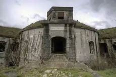 Entrance to the fort with concrete infantry position above