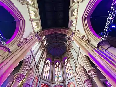 The polygonal apse with stained-glass windows by Ralph Bolton Edmundson