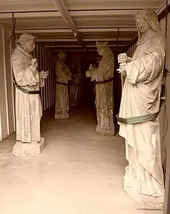 Statues of Franciscan Saints in storage prior to being reinstated in the nave