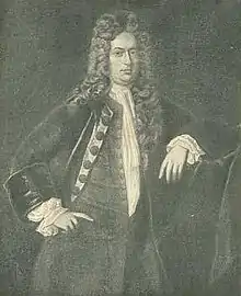 A three quarter length black and white engraved portrait of William Dummer. He is wearing fashionable early 18th century clothing and a long wig.