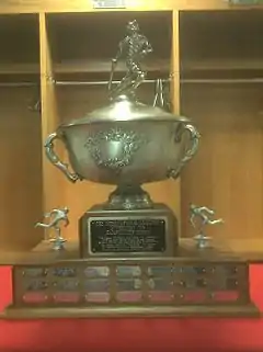 A trophy made of metal and wood