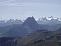 View from Gampenkogel of the mighty summit block of the Großer Rettenstein. Background: High Tauern and Großvenediger.