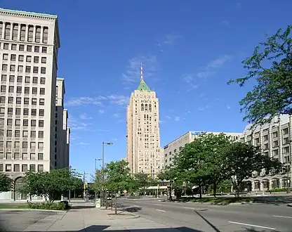 Grand Boulevard looking west through New Center. The National Historic Landmarks Cadillac Place (left) and the Fisher Building in the background, with the Hotel St. Regis on the right