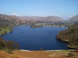 A lake surrounded by hills