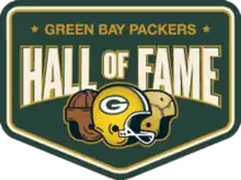 A logo that says Green Bay Packers Hall of Fame. Three different types of helmets are shown, each one from a different era.