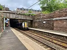 Train from Gourock via tunnel, arriving under aqueduct