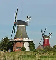 Image 25Two smock mills with a stage in Greetsiel, Germany (from Windmill)