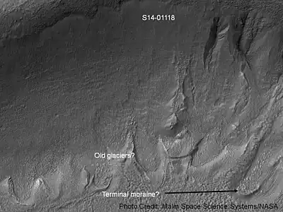 Gullies and possible remains of old glaciers in a crater in Eridania quadrangle, north of the large crater Kepler. One suspected glacier, to the right, has the shape of a tongue. Image was taken by the Mars Global Surveyor under the Public Target program.