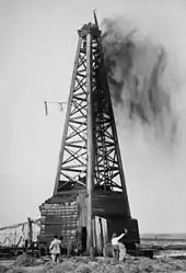 Image 8Gushers brought in many of Oklahoma's early oil fields—this one on February 21, 1922, near Okemah. (from History of Oklahoma)