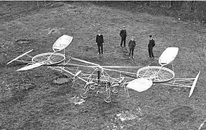 Image 40Paul Cornu's helicopter, built in 1907, was the first manned flying machine to have risen from the ground using rotating wings instead of fixed wings. (from History of aviation)