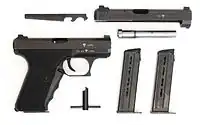 Heckler & Koch P7K3 (.22 LR slide and barrel installed, additional .32 ACP (7.65mm) slide, barrel and two magazines are visible, so are the exchange tool and carbon scraper)