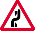 Divert to another carriageway to right ahead (direction may be reversed)