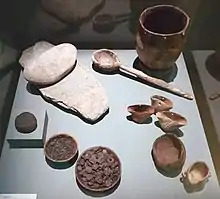 Pottery, implements and foodstuffs