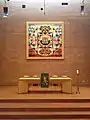 The large reredos panel crafted by Leonard French above the Communion Table in the Sanctuary.