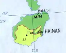 A map of the island of Hainan, which is roughly oval in shape, tilted so that the longer side is at a roughly 45 degree angle pointing towards the northwest on a map where north is at the top. An area taking up the bottom left half of the island is highlighted, indicating the location where the Li people are based.