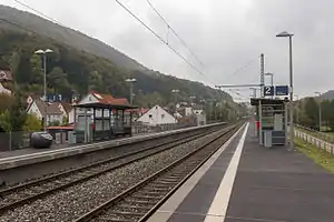 Double-tracked railway line with side platforms