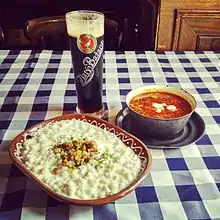 Image 18Halušky with bryndza cheese, kapustnica soup and Zlatý Bažant dark beer—examples of Slovak cuisine (from Culture of Slovakia)