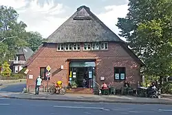 Thatched-roofed house in the center of the old Osdorf village