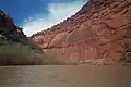 Historic hanging flume clings precariously to canyon walls