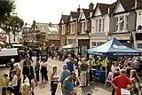 Hanwell Broadway showing the Coronation clock tower, with the Duke of York public house to the left of the image.