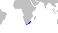 Partial world map with a blue outline along the coast of South Africa