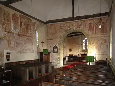 The 12th-century frescos in St Botolph's Church, England, are part of the 'Lewes Group' of Romanesque paintings created for Lewes Priory.