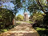 Originally at Hayground off Montauk Hgwy, between Bridgehampton and Water Mill, it was moved in 1950 to the dune estate of Robert Dowling. Hidden by houses and trees, it is not accessible within the gated compound on Windmill lane.