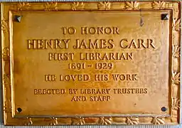 Plaque honoring the first librarian