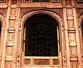 The mohallah is known for the intricate wood-carvings that decorate its homes.