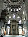 View of the mosque's mihrab (center) and the sultan's loge (upper left)