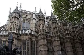 Henry VII Chapel at Westminster Abbey (1503–), with Perpendicular tracery and blind panels.