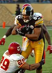 The Chiefs defense takes on running back Hines Ward