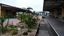 Southbound view after grade separation works, with new station in background in March 2021