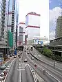 Connaught Road West Flyover leading up to the Shun Tak Centre (background) in August 2005