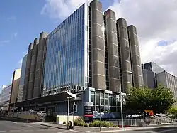 Brutalist building in glass and concrete