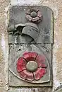 Canting arms of the House of Rosenberg as they appear on the gate of Vyšší Brod Monastery